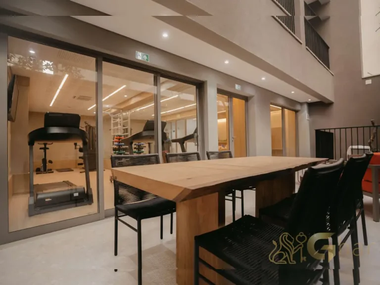 Área externa com mesas Next Haddock Studios Jardim Paulista São Paulo