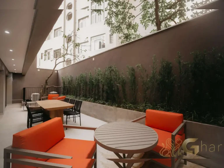 Espaço externo com mesas Next Haddock Studios Jardim Paulista São Paulo