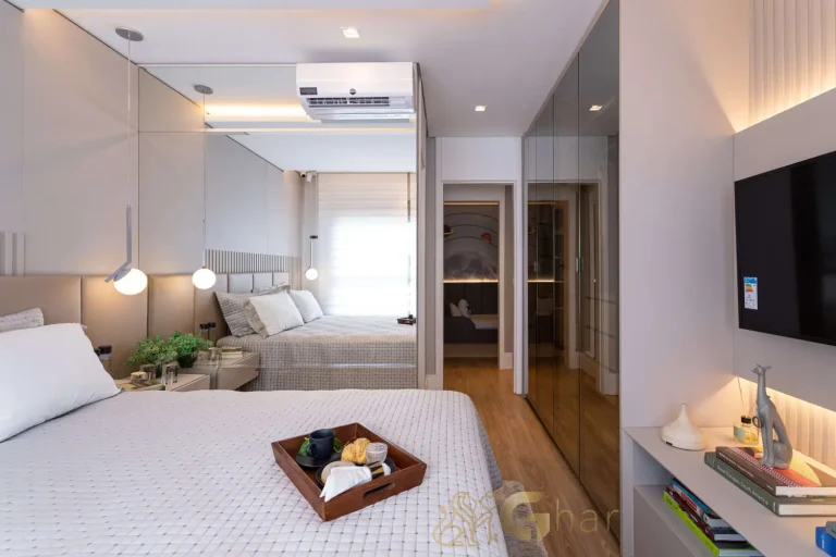 Quarto da suíte de casal decorado no Bosque Pitangueiras Jardim das Perdizes