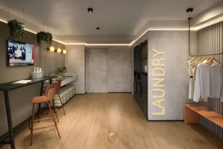 Lavanderia compartilhada no condomínio Häuser Home Design Moema em São Paulo
