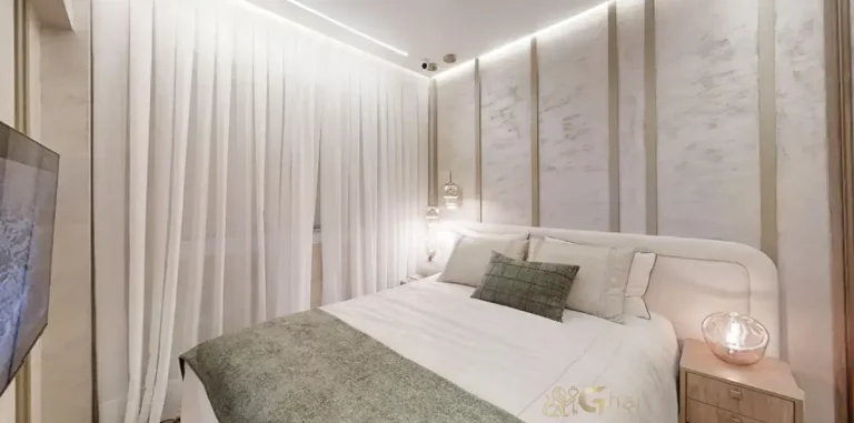 O dormitório decorado do Living Grand Exclusive Tucuruvi alia sofisticação e praticidade, destacando o estilo de vida contemporâneo.