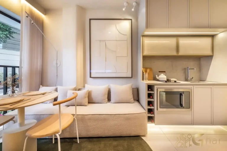 Cozinha integrada à sala no apartamento decorado do QG Vila Nova Conceição by You,Inc