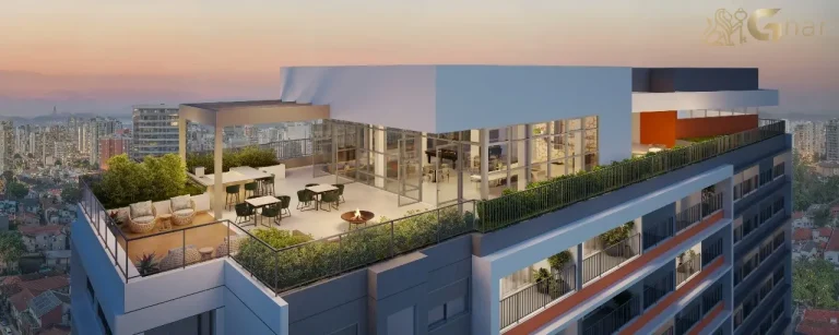 Cobertura do The Collection Vila Mariana com sky bar e área de convivência iluminada