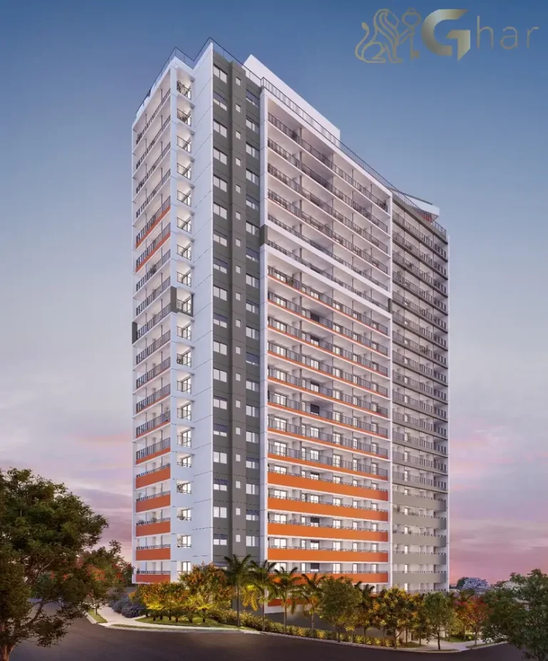 Fachada iluminada do The Collection Vila Mariana vista noturna da torre residencial