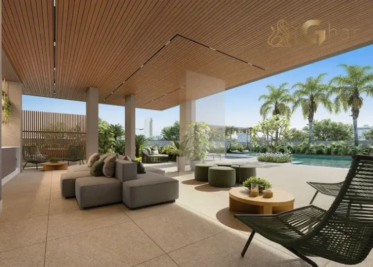 Lounge da piscina do MAC Campo Belo com área de descanso e lazer ao ar livre