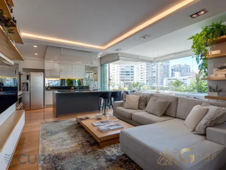Apartamento decorado da Cury Construtora e Incorporadora com sala e cozinha aberta