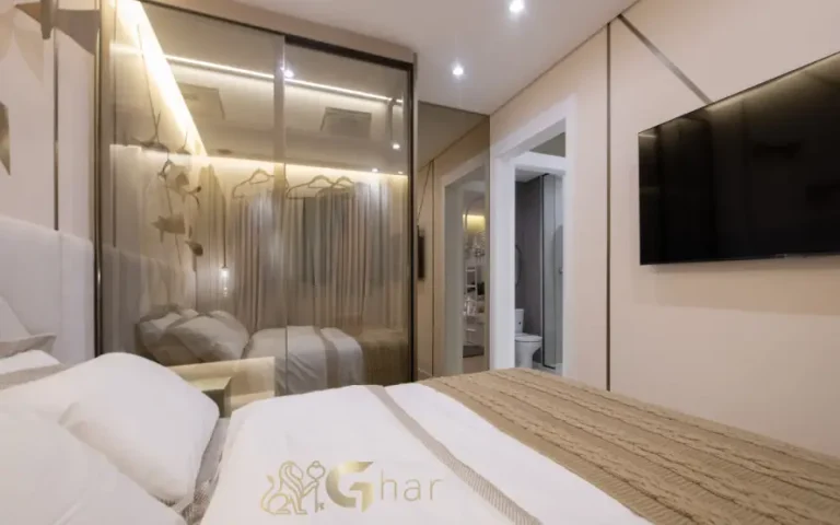 Quarto de casal do apartamento decorado do Guedala Park Premium no Jardim Guedala