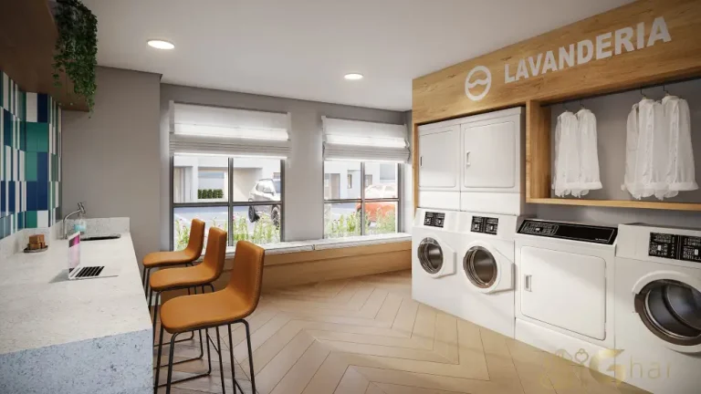 Lavanderia compartilhada do condomínio Novo Mundo Carrão com equipamentos modernos