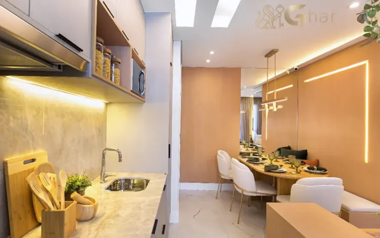 Sala de jantar com cozinha aberta no apartamento decorado do Uniq Panamby