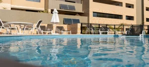 Piscina em condomínio com lazer em apartamentos no bairro Santana São Paulo