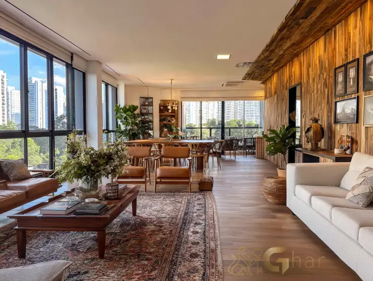 Sala sofisticada de imóvel de luxo na Zona norte de São Paulo com integração de ambientes e acabamento premium