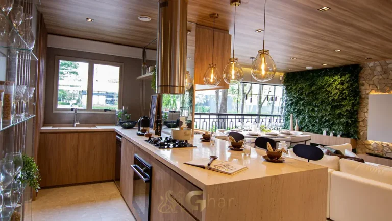 Cozinha com bancada e ilha do apartamento decorado do condomínio Ledge Brooklin no bairro do Brooklin em São Paulo