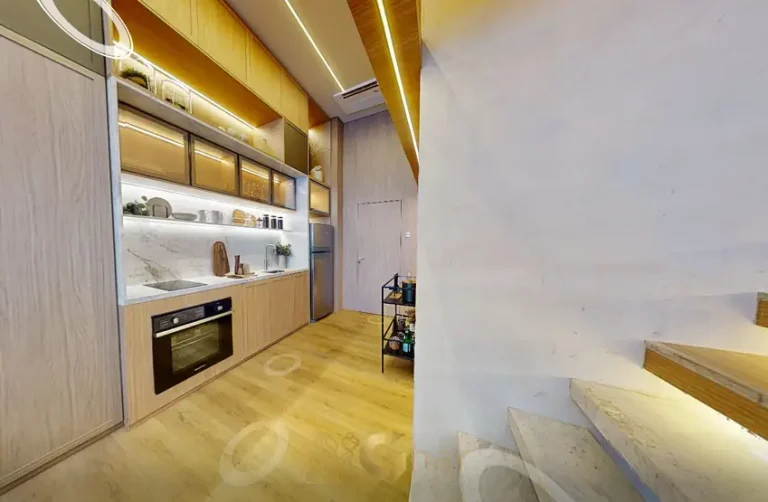 Cozinha americana do decorado do condomínio NIK Estilo Paulista no bairro do Paraíso em São Paulo