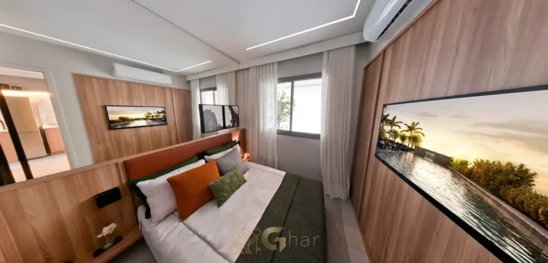Quarto com cama casal e mobiliário planejado do decorado do condomínio Nex One Paraíso no bairro do Paraíso, São Paulo
