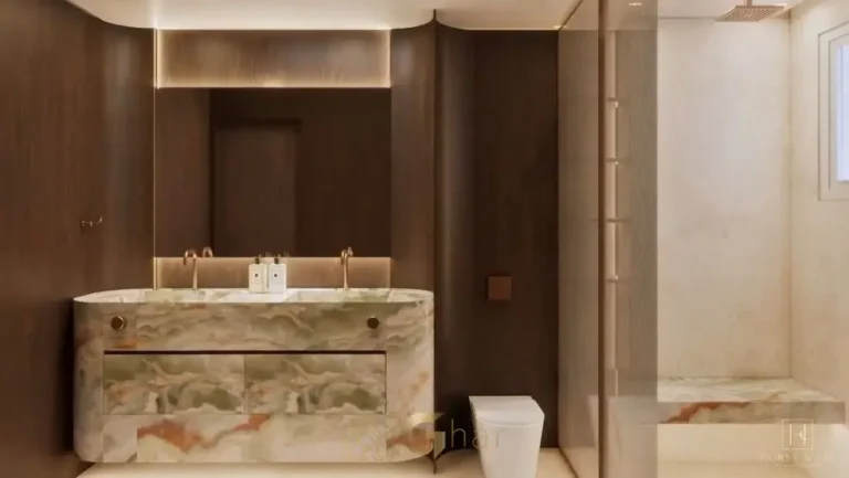 Banheiro com acabamento em mármore do apartamento decorado do condomínio Maison Gabrielle no bairro de Moema, São Paulo