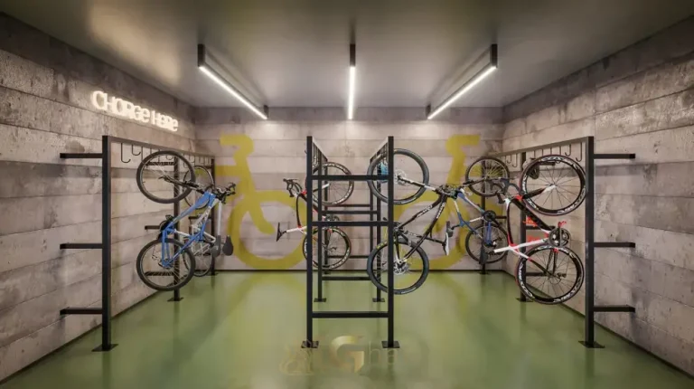 Bicicletário premium com piso verde autoral em apartamentos no bairro de Moema, São Paulo