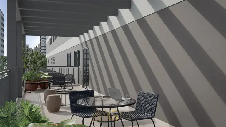Coworking com estações de trabalho do condomínio Grafik Moema no bairro de Moema, São Paulo