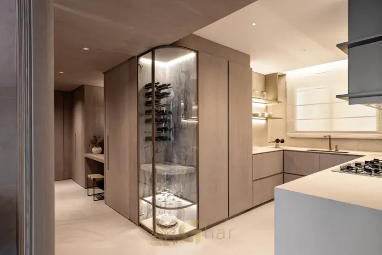 Cozinha integrada do apartamento decorado do condomínio Altier Moema Pássaros no bairro de Moema, São Paulo