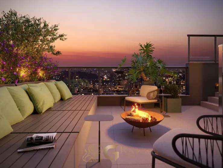 Lounge externo do rooftop do condomínio Claris Moema no bairro de Moema, São Paulo