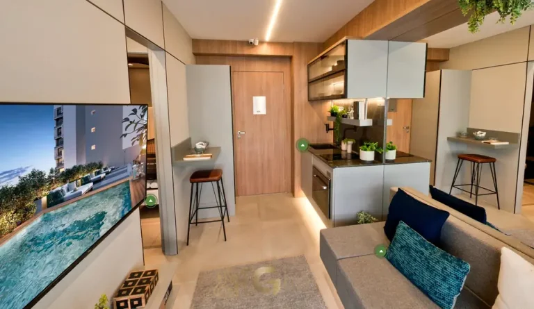 Sala integrada à cozinha do apartamento decorado em condomínio residencial no bairro de Moema, na Zona Sul de São Paulo