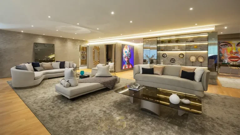 Sala de estar do apartamento decorado do condomínio Cyrela Moema by YOO no bairro de Moema, São Paulo