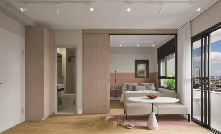 Integração entre sala e varanda do apartamento decorado em condomínio residencial no bairro da Vila Olímpia, na Zona Sul de São Paulo