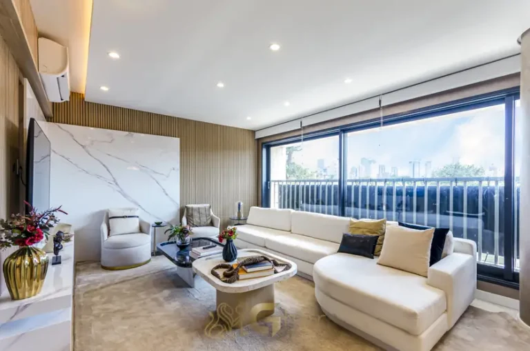 Sala de estar integrada ao living em condomínio residencial no bairro do Brooklin, na Zona Sul de São Paulo